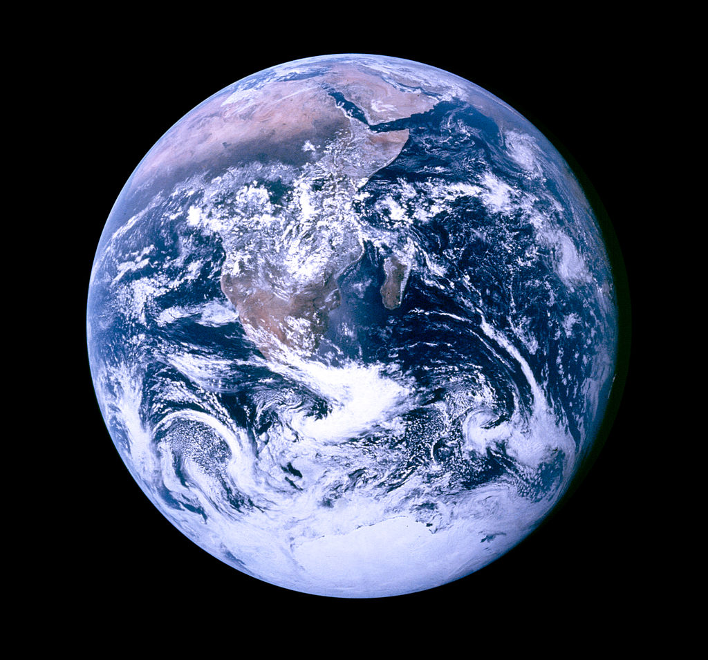 Image shows a photograph of earth taken from space.